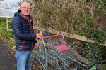 Simon Walker removing abandoned shopping trolleys