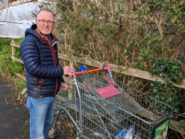 Simon Walker removing abandoned shopping trolleys